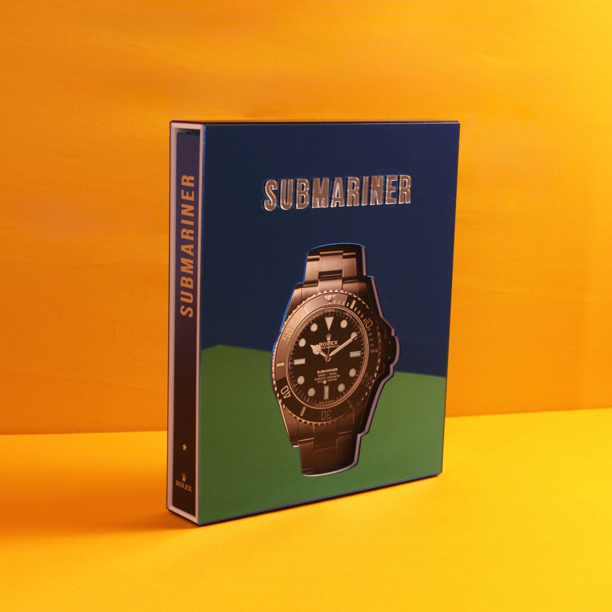 Livro Rolex Oyster Perpetual Submariner com capa acrílica premium espelhada sob medida, peça decorativa de luxo