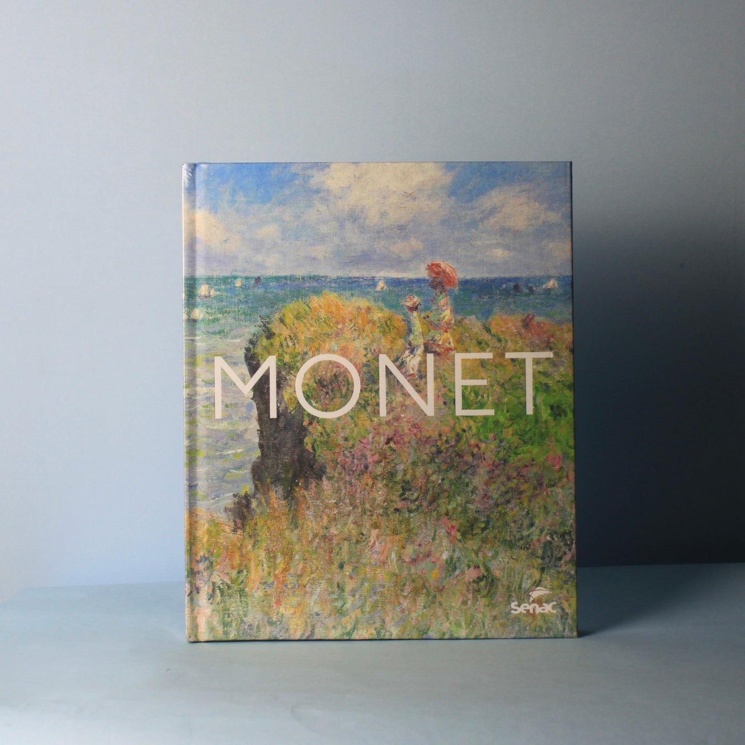 Livro Monet em capa dura da Editora Senac São Paulo, coffee table book de arte impressionista da Modern Mood