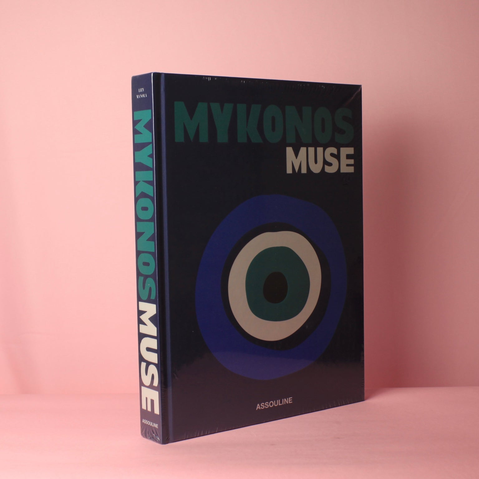 Livro Assouline Mykonos Muse coffee table book de luxo com capa em linho e slipcase turquesa