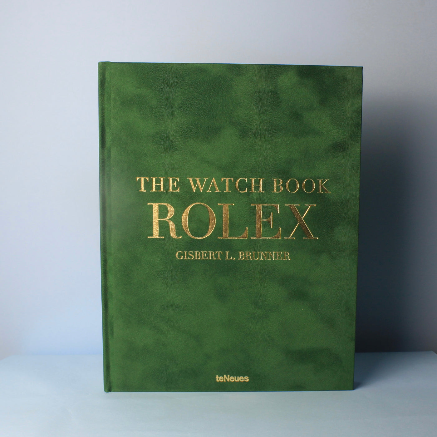 Livro The Watch Book Rolex 3ª edição capa dura verde aveludada com detalhes dourados - Modern Mood